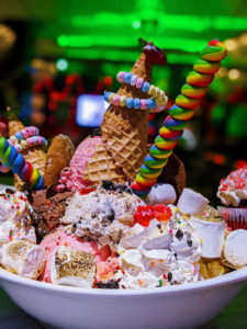 Sugar Factory Chicago - Instagrammable Restaurants in Chicago - If you're looking for the most Instagram worthy places in Chicago, you have to check out Sugar Factory! Their King Kong Sundae is the dessert of a lifetime. #sugarfactory #chicago #choosechicago